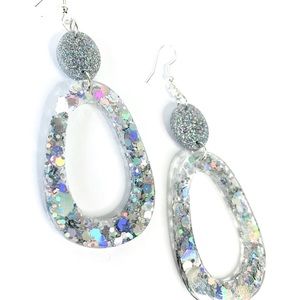 Glittery Holographic dangle earrings with silver hardware.